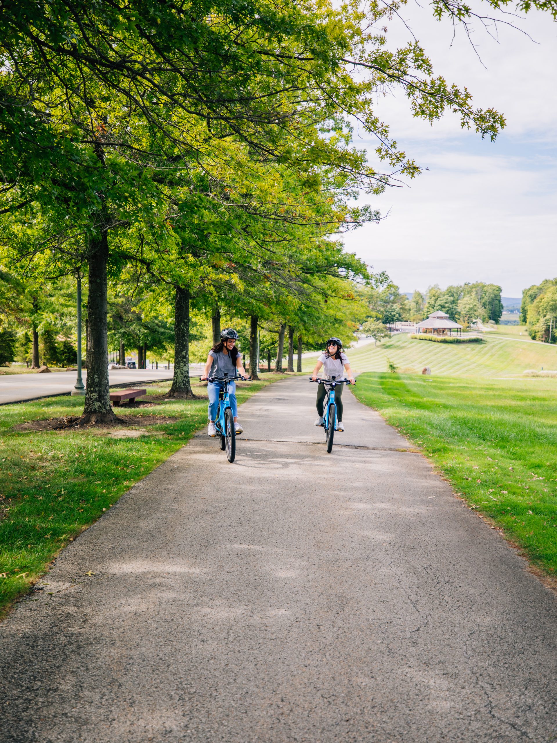 two people riding bikes