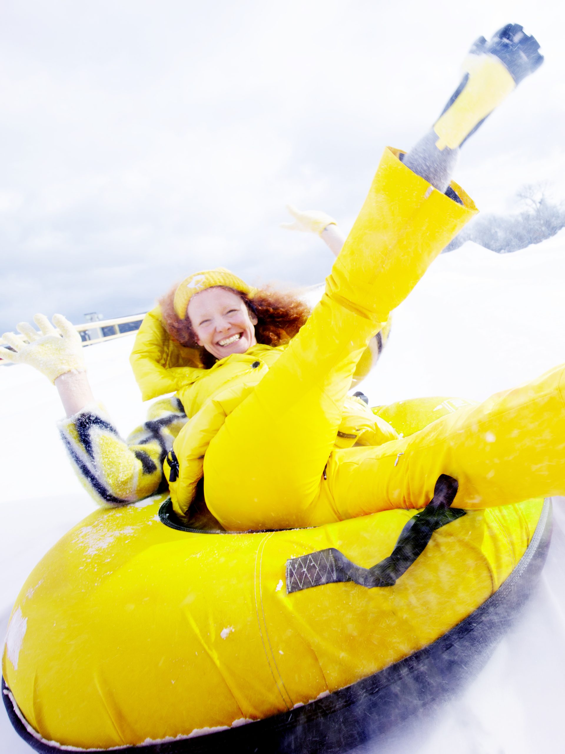 person snow tubing