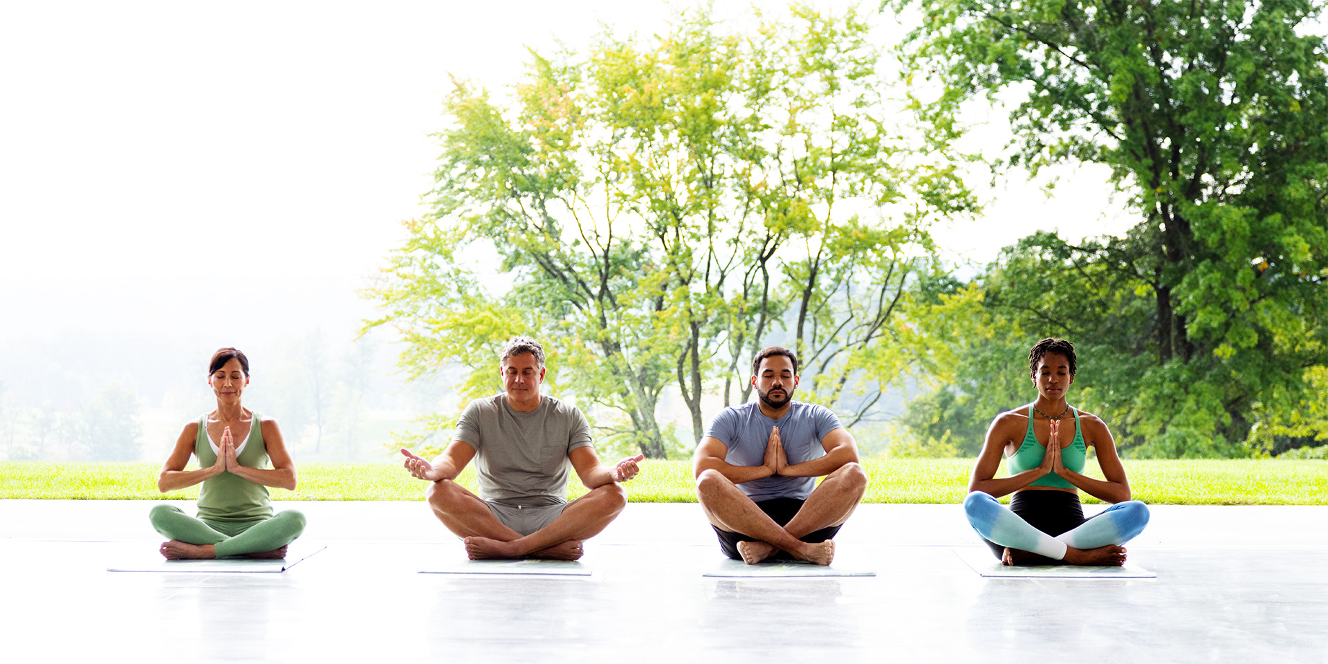 Group of friends meditating