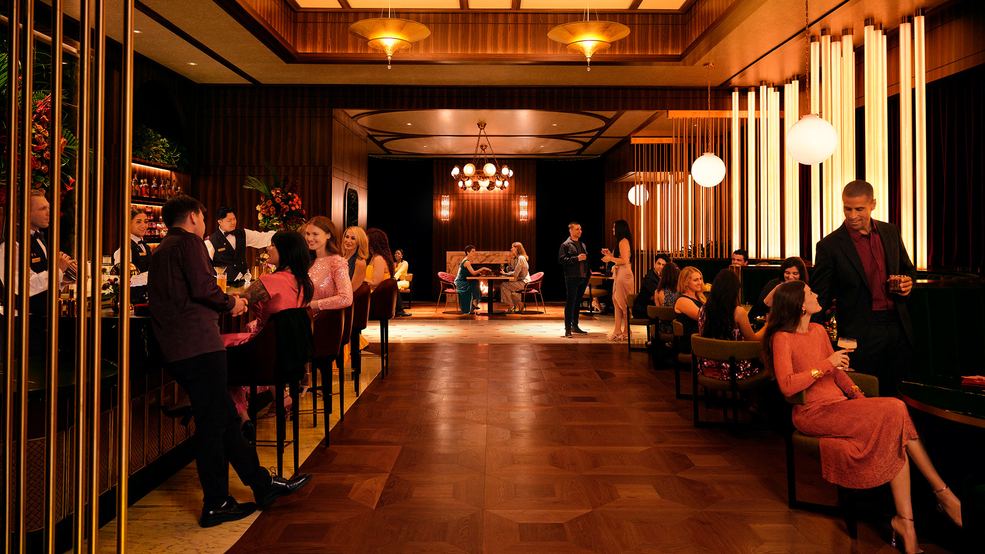 Entrance view of the restaurant. On the left you see the bar and on the right you see small tables