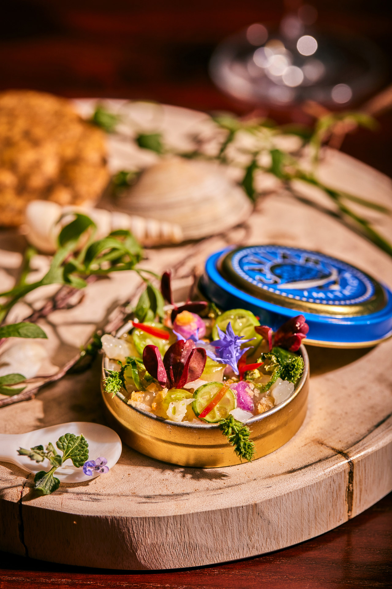 Open gallery overlay: up close image of caviar on a wooden plate