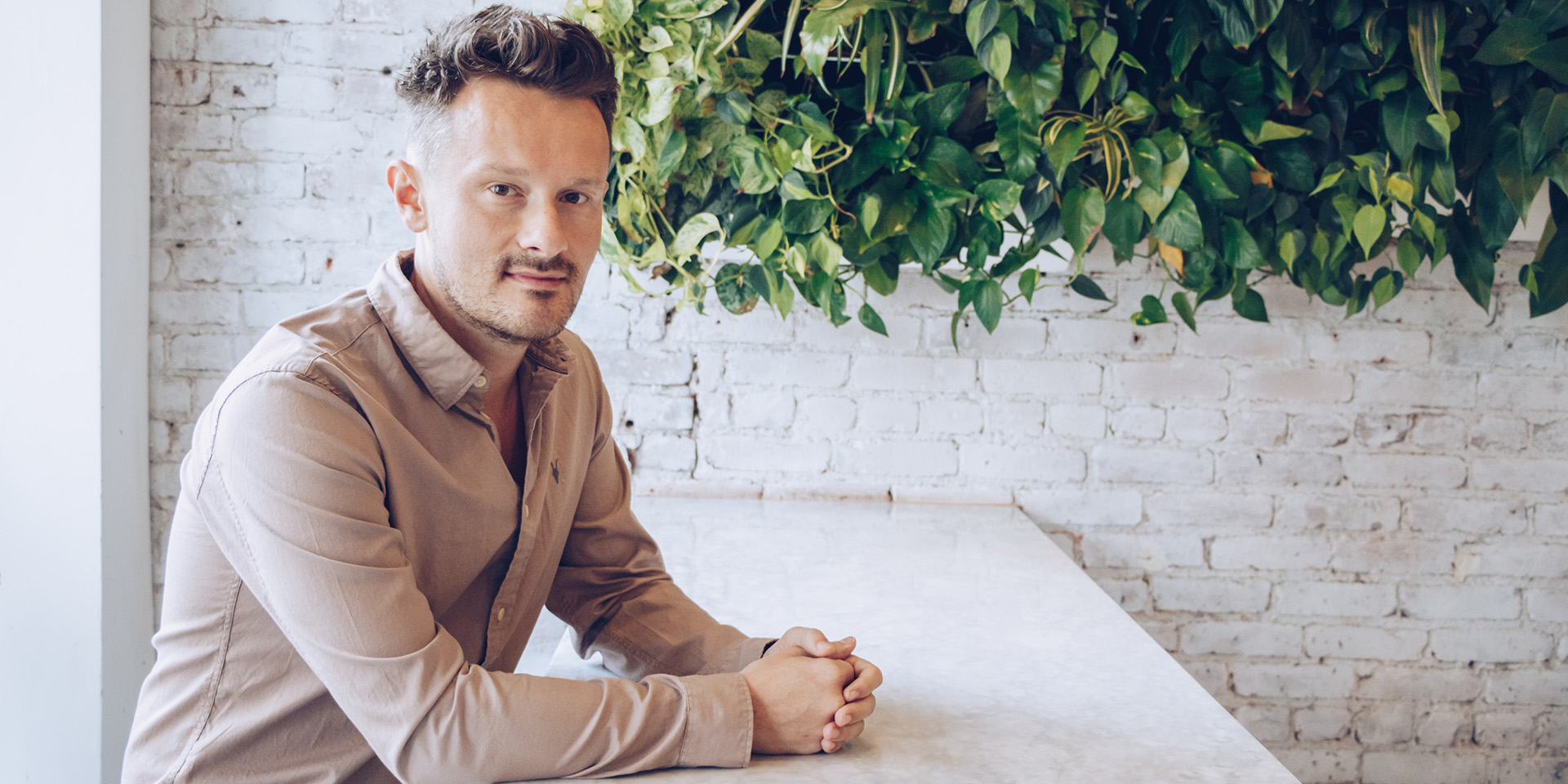 Dr. Will Cole sitting at a table